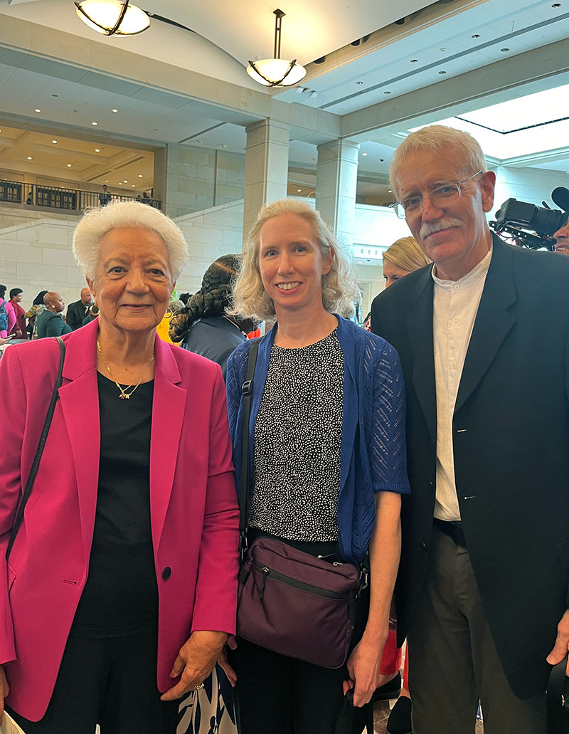 photo of Dorothy Vaughan's daughter Ann Hamilton with medal designers Emily S. Damstra and Richard A. Masters